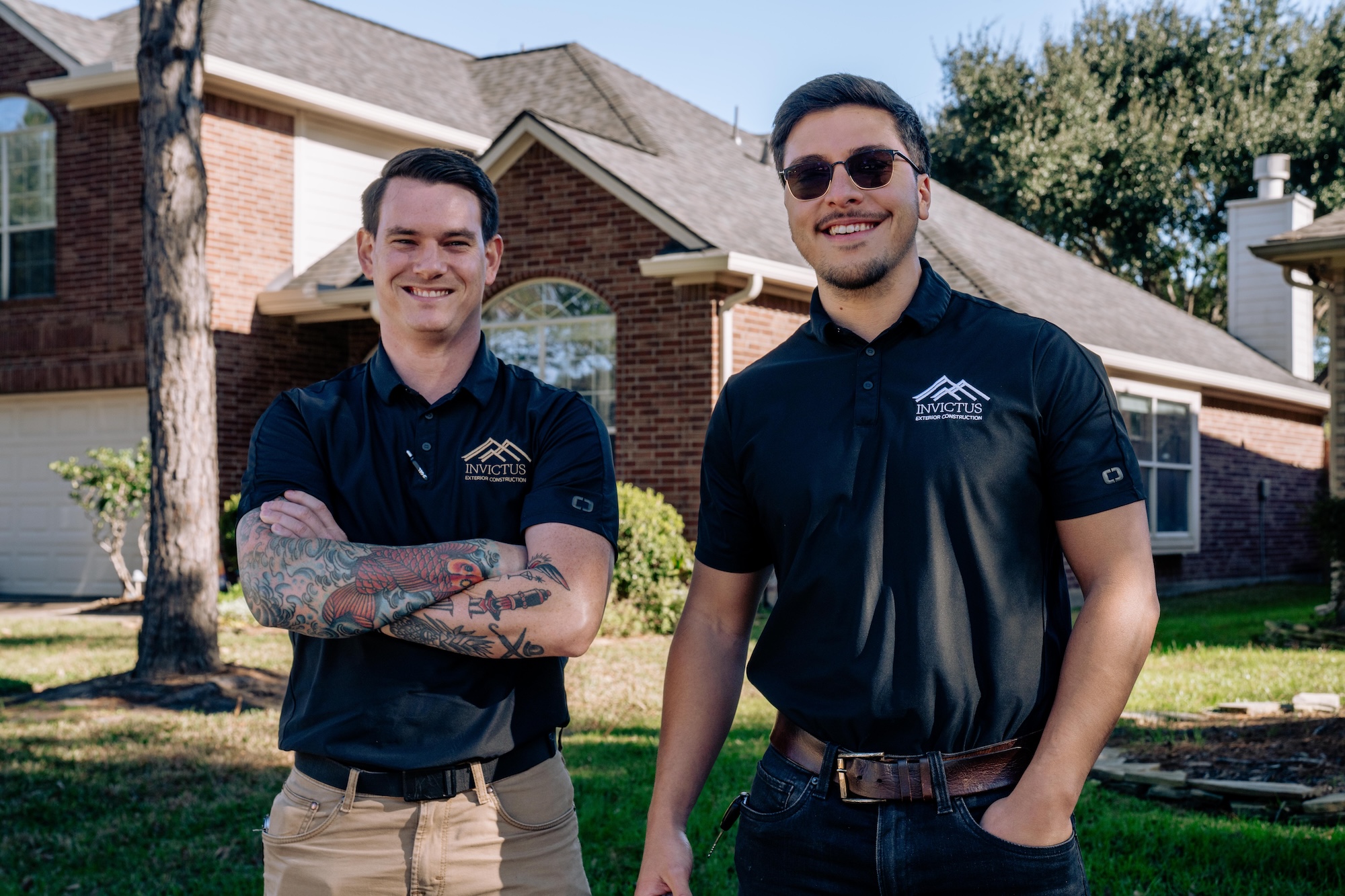 Invictus Exterior owners outside a Houston home